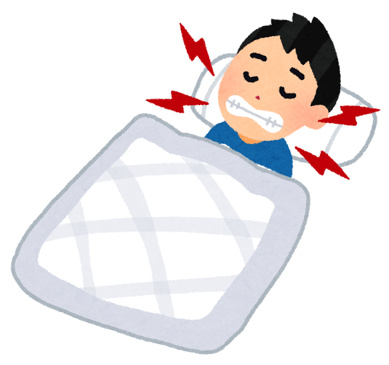 歯ぎしりをしながら寝る男性