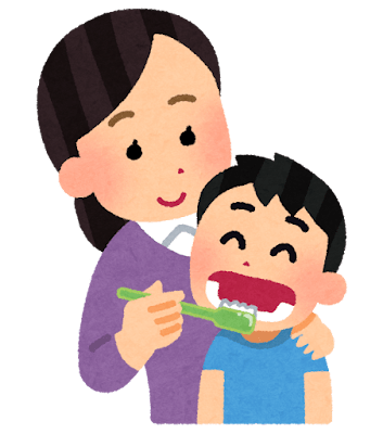 仕上げ磨きをする様子