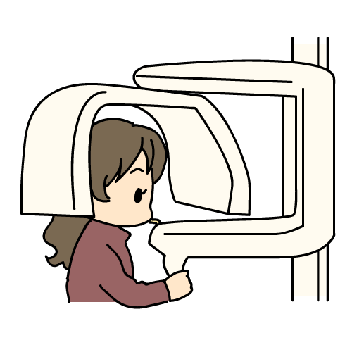 歯のレントゲンを撮る女性
